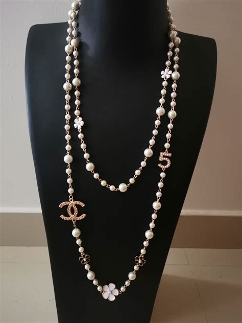 coco chanel pearl necklaces|long Chanel necklace with pearls.